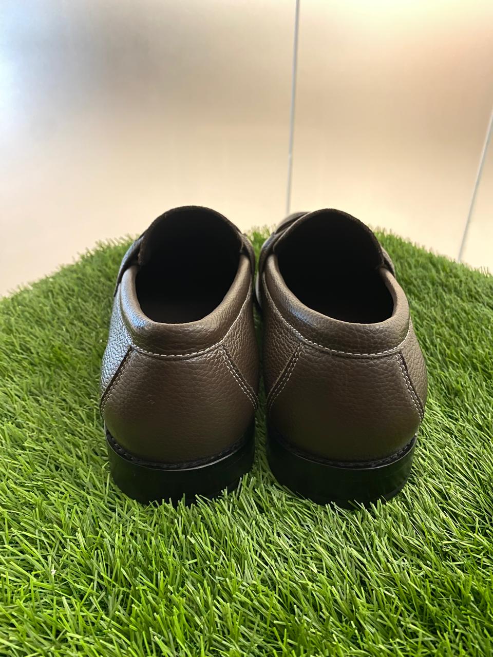 Louis Vuitton Major Loafers in dark brown grained calf leather.